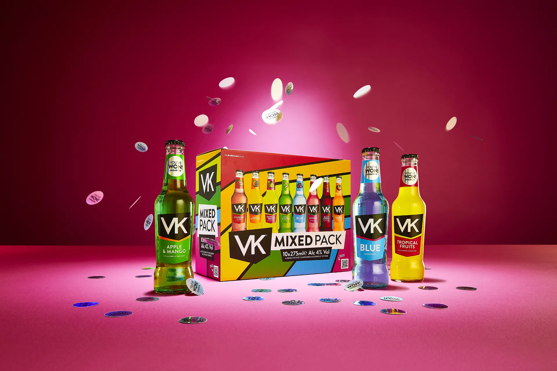 VK mixed pack product photo with green, blue and tropical fruits flavours on pink background